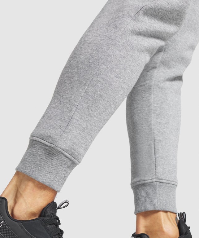 Pantalones Jogger Gymshark Crest Gris | aW54oySBenF